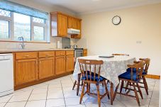 Kilkieran Holiday Home Connemara. Pine kitchen country style, dining table 6 chairs. 