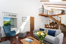 Open plan living and dining room in Clifden Countryside Holiday Home