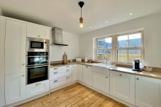 Clifden Town Townhouse. Connemara. Modern fully equipped kitchen. Bright new contemporary units. Wooden floors.