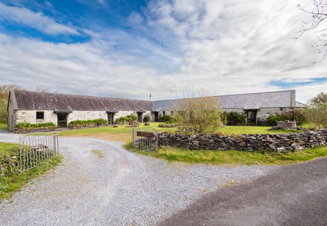 Ventry Farm Cottages - a cluster of rustic and charming accommodation available on Dingle Peninsula, County Kerry Exterior view of Ventry Farm Cottages - a cluster of rustic and charming accommodation available on Dingle Peninsula, County Kerry