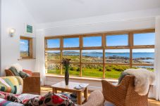 Ocean View Holiday Home. Living room with spectacular views to the sea. 