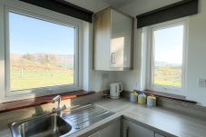 Honeybee Cottage Valentia Co Kerry.  Bright kitchen with views to garden. 