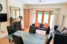 Heyward Mews Holiday Homes,. Open plan dining area, bright, large windows, comfortable seating. 